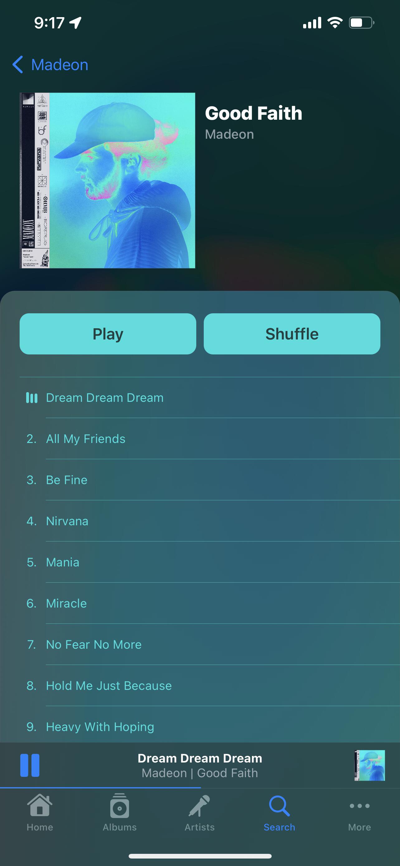 Image of the album view in dark mode with a predominantly blue record
